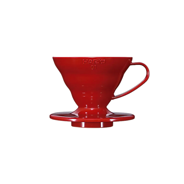 Red Hario coffee dripper on a white background